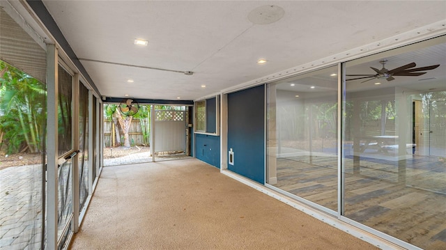 3525 Riviera Dr, Sarasota, FL 34232 - unfurnished sunroom with recessed lighting and ceiling fan