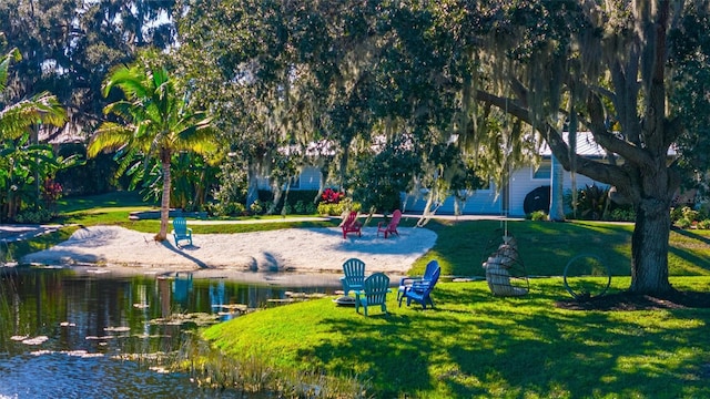 5311 36th Ave E, Palmetto, FL 34221 - view of home's community with a lawn and a water view