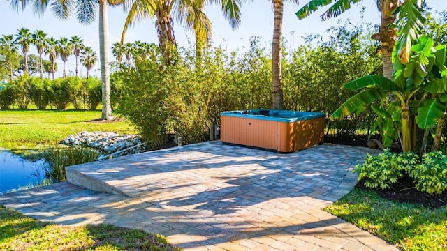 5311 36th Ave E, Palmetto, FL 34221 - view of patio / terrace with a hot tub