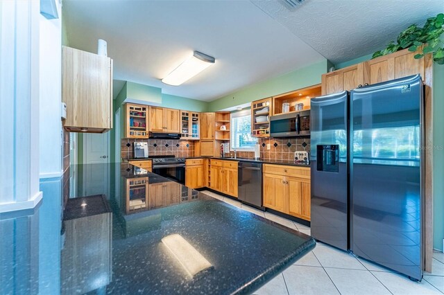 5311 36th Ave E, Palmetto, FL 34221 - kitchen featuring black dishwasher, refrigerator with ice dispenser, open shelves, electric stove, and stainless steel microwave
