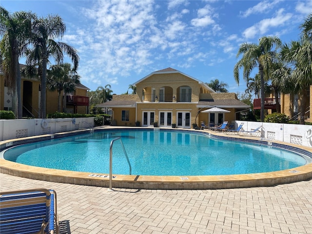 1959 Toucan Way Unit 206, Sarasota, FL 34232 - community pool with french doors and a patio
