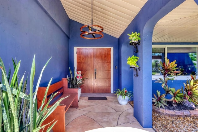 3636 Torrey Pines Blvd, Sarasota, FL 34238 - view of exterior entry featuring a porch and stucco siding