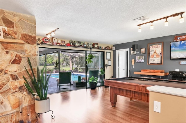 3636 Torrey Pines Blvd, Sarasota, FL 34238 - rec room featuring rail lighting, a textured ceiling, wood finished floors, and billiards