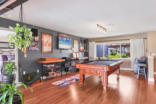 3636 Torrey Pines Blvd, Sarasota, FL 34238 - game room featuring wood finished floors, billiards, a textured ceiling, and rail lighting