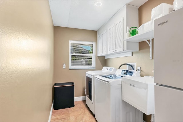 3636 Torrey Pines Blvd, Sarasota, FL 34238 - laundry room with washer and dryer and cabinet space