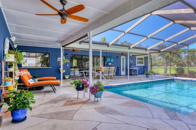 3636 Torrey Pines Blvd, Sarasota, FL 34238 - swimming pool with a ceiling fan, a patio, grilling area, and glass enclosure