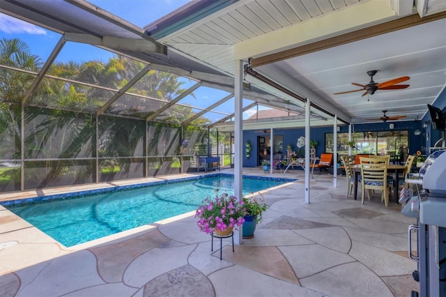 3636 Torrey Pines Blvd, Sarasota, FL 34238 - outdoor pool featuring ceiling fan, a patio, and glass enclosure
