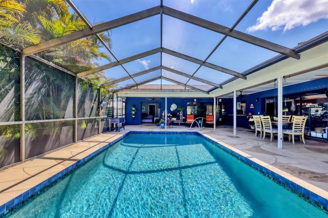 3636 Torrey Pines Blvd, Sarasota, FL 34238 - outdoor pool featuring ceiling fan, a patio, and glass enclosure