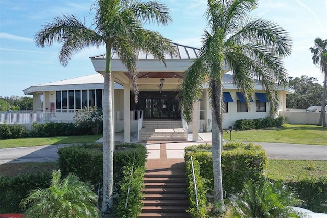 3636 Torrey Pines Blvd, Sarasota, FL 34238 - view of front of house with covered porch and stucco siding
