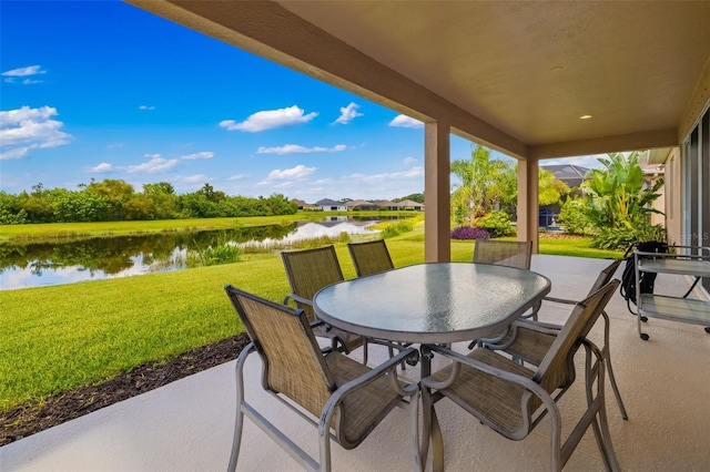773 Rosemary Cir, Bradenton, FL 34212 - view of patio with a water view and outdoor dining space