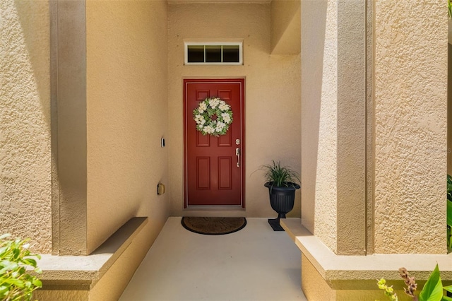 773 Rosemary Cir, Bradenton, FL 34212 - doorway to property with stucco siding