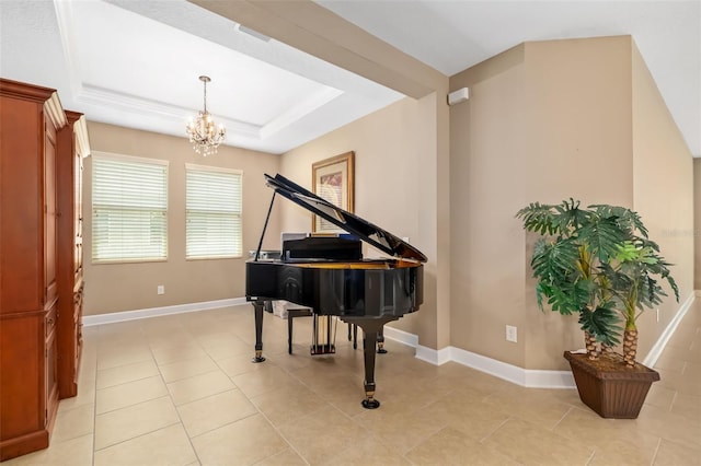 773 Rosemary Cir, Bradenton, FL 34212 - sitting room with a chandelier, a tray ceiling, and light tile patterned floors