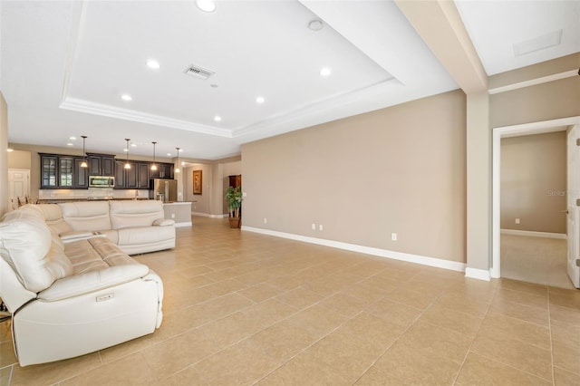 773 Rosemary Cir, Bradenton, FL 34212 - living room with a raised ceiling, recessed lighting, and light tile patterned floors