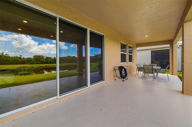 773 Rosemary Cir, Bradenton, FL 34212 - view of patio / terrace with a water view and outdoor dining space