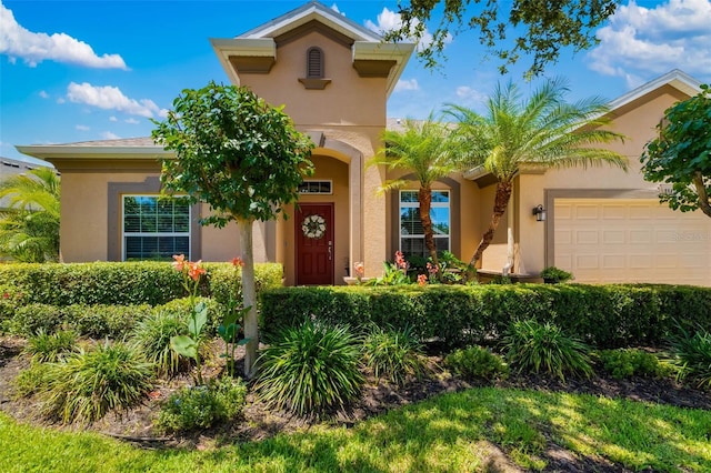 773 Rosemary Cir, Bradenton, FL 34212 - mediterranean / spanish home with a garage and stucco siding