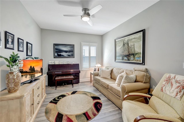 6219 Golden Nettle Dr, Apollo Beach, FL 33572 - living room with light wood finished floors and ceiling fan