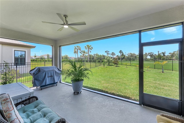 6219 Golden Nettle Dr, Apollo Beach, FL 33572 - unfurnished sunroom featuring a ceiling fan and healthy amount of natural light