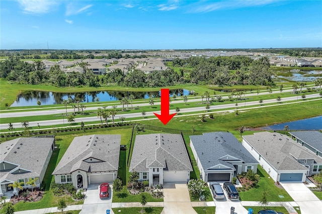 6219 Golden Nettle Dr, Apollo Beach, FL 33572 - aerial perspective of suburban area with a large body of water