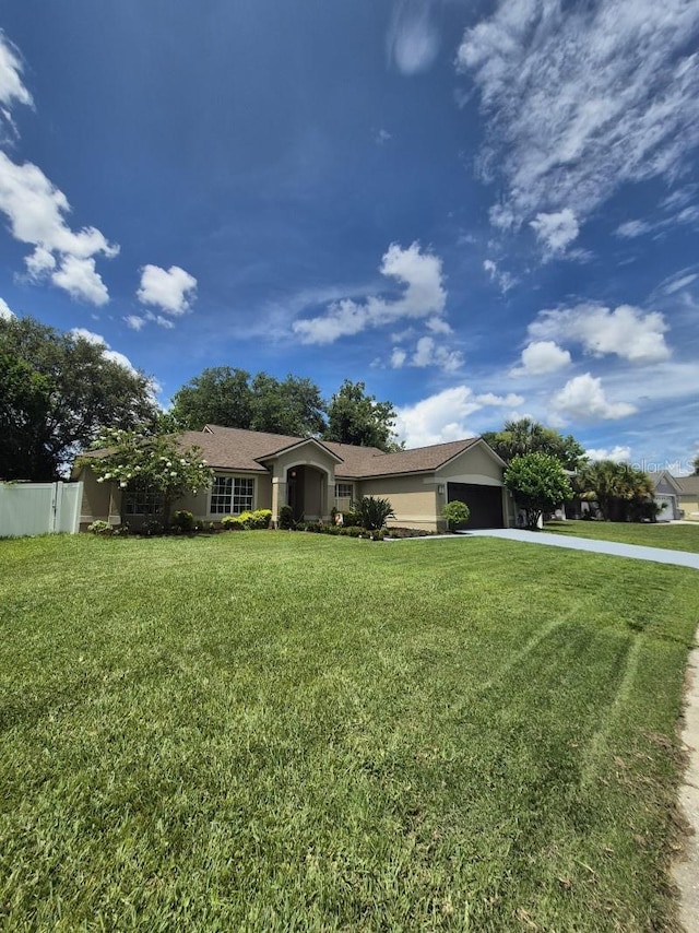 15917 Mercott Ct, Clermont, FL 34714 - ranch-style home with concrete driveway, an attached garage, and stucco siding