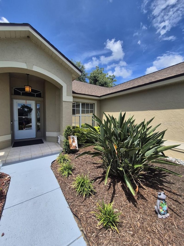 15917 Mercott Ct, Clermont, FL 34714 - entrance to property featuring stucco siding