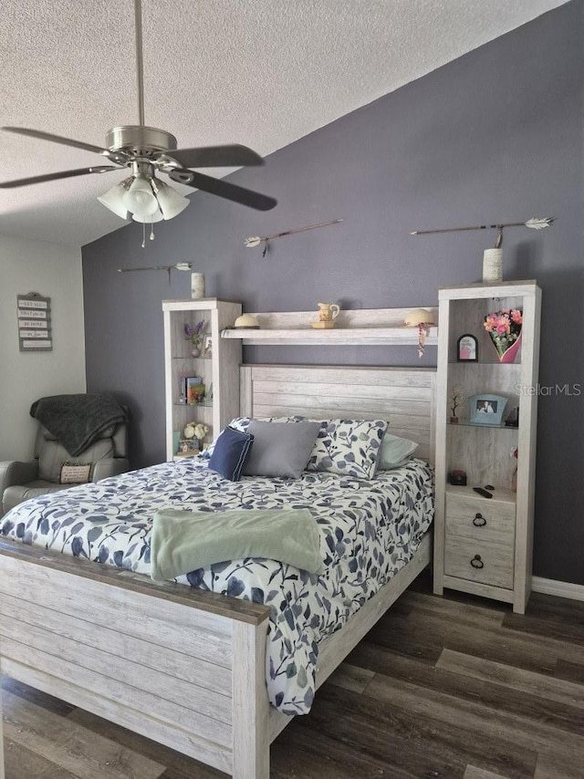 15917 Mercott Ct, Clermont, FL 34714 - bedroom featuring a textured ceiling, wood finished floors, and ceiling fan
