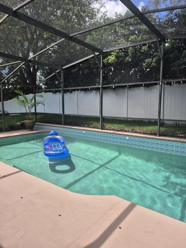 15917 Mercott Ct, Clermont, FL 34714 - view of swimming pool with a fenced backyard and glass enclosure
