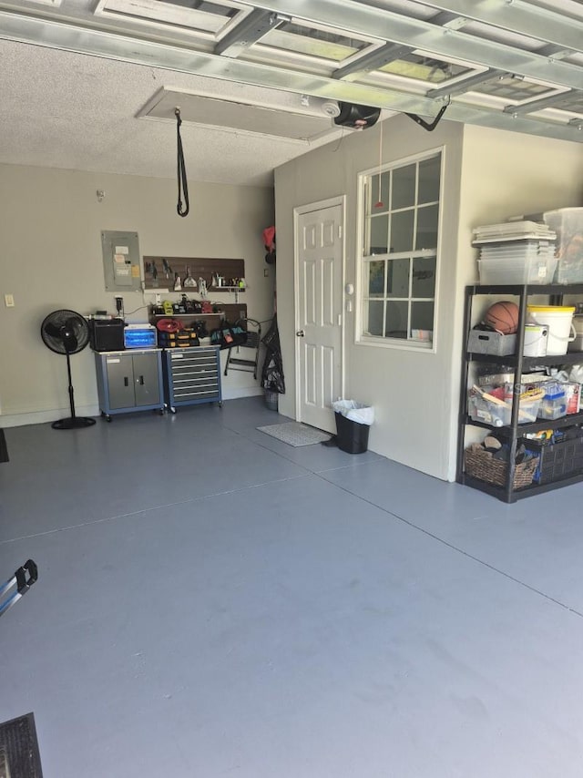 15917 Mercott Ct, Clermont, FL 34714 - garage featuring electric panel and a garage door opener