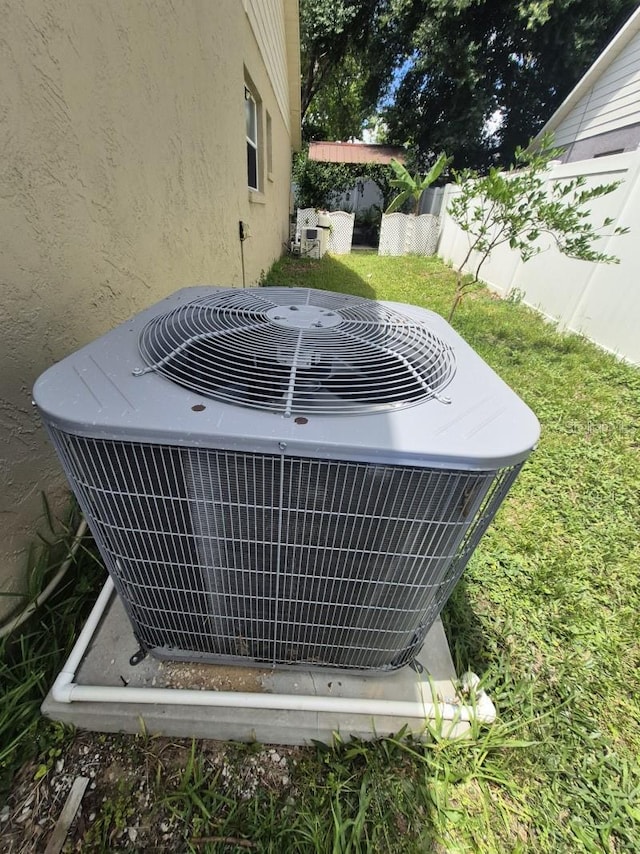 15917 Mercott Ct, Clermont, FL 34714 - exterior view of a central air condition unit and stucco siding