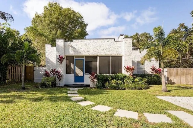 522 31st St W, Bradenton, FL 34205 - rear view of property with stucco siding and entry steps