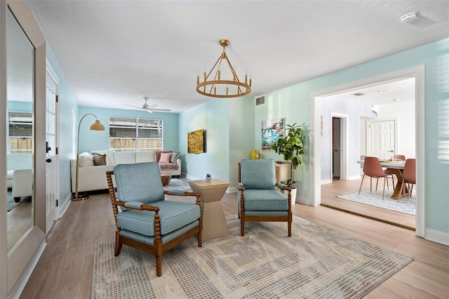522 31st St W, Bradenton, FL 34205 - living area featuring light wood finished floors and a ceiling fan