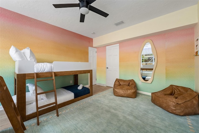 522 31st St W, Bradenton, FL 34205 - carpeted bedroom with baseboards and ceiling fan