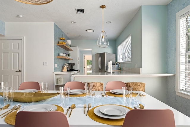 522 31st St W, Bradenton, FL 34205 - dining area featuring healthy amount of natural light