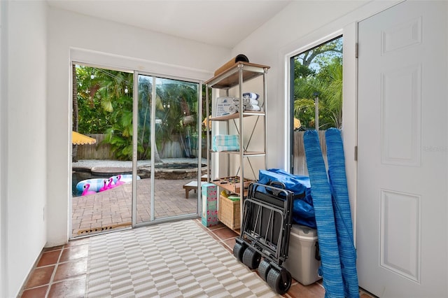 522 31st St W, Bradenton, FL 34205 - doorway to outside featuring plenty of natural light and tile patterned floors