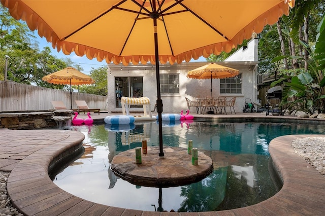 522 31st St W, Bradenton, FL 34205 - view of swimming pool featuring a patio and outdoor dining area