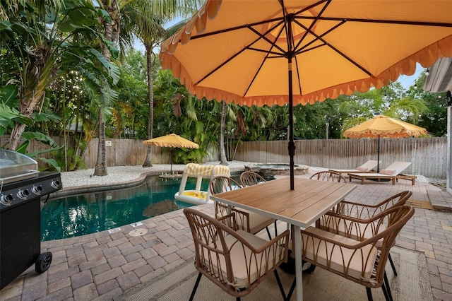 522 31st St W, Bradenton, FL 34205 - view of pool with a patio, area for grilling, a fenced backyard, and outdoor dining space