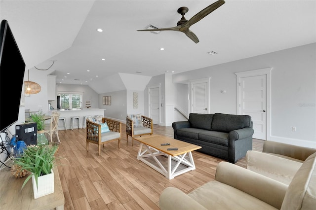 538 Canal Rd, Sarasota, FL 34242 - living room featuring a ceiling fan, vaulted ceiling, light wood finished floors, and recessed lighting