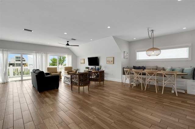 538 Canal Rd, Sarasota, FL 34242 - living area featuring wood finished floors, ceiling fan, lofted ceiling, and recessed lighting