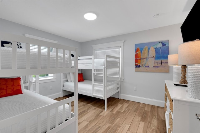 538 Canal Rd, Sarasota, FL 34242 - bedroom with baseboards and light wood-type flooring