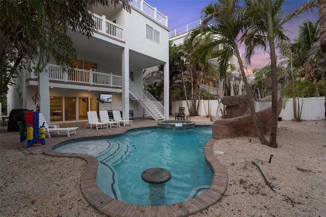 538 Canal Rd, Sarasota, FL 34242 - view of swimming pool featuring stairs, a patio area, and a pool with connected hot tub