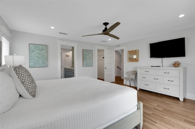 538 Canal Rd, Sarasota, FL 34242 - bedroom with light wood-style flooring, recessed lighting, ceiling fan, and ensuite bathroom