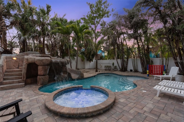 538 Canal Rd, Sarasota, FL 34242 - view of swimming pool with a patio, a fenced backyard, and a pool with connected hot tub