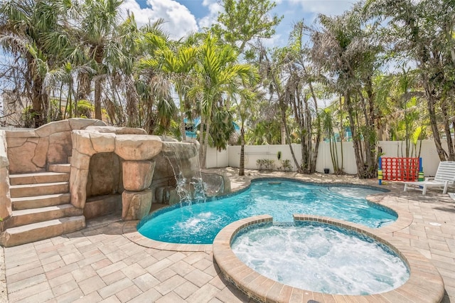 538 Canal Rd, Sarasota, FL 34242 - view of pool featuring a patio area, a fenced backyard, and a pool with connected hot tub