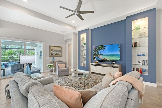 7983 Sandstar Way, Sarasota, FL 34240 - living area featuring built in features, a ceiling fan, recessed lighting, and light tile patterned floors