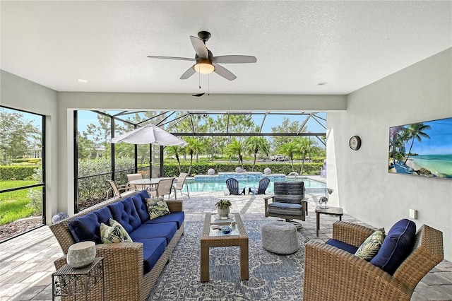 7983 Sandstar Way, Sarasota, FL 34240 - sunroom / solarium with an outdoor hangout area and a ceiling fan