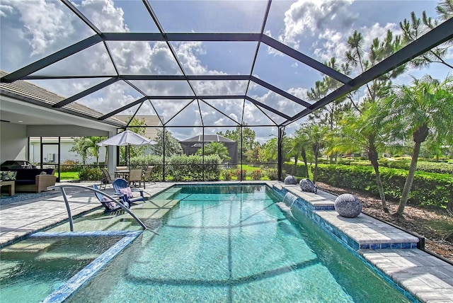 7983 Sandstar Way, Sarasota, FL 34240 - outdoor pool featuring a patio