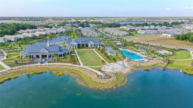 7983 Sandstar Way, Sarasota, FL 34240 - aerial perspective of suburban area with a pool area and a nearby body of water