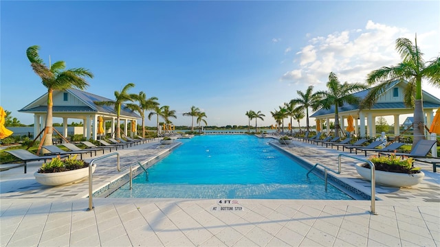7983 Sandstar Way, Sarasota, FL 34240 - community pool with a gazebo and a patio area