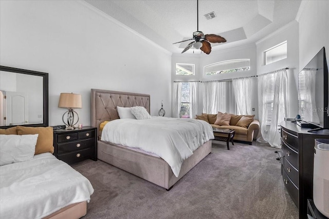 4013 Greystone Dr, Clermont, FL 34711 - carpeted bedroom with a towering ceiling, ornamental molding, and a ceiling fan