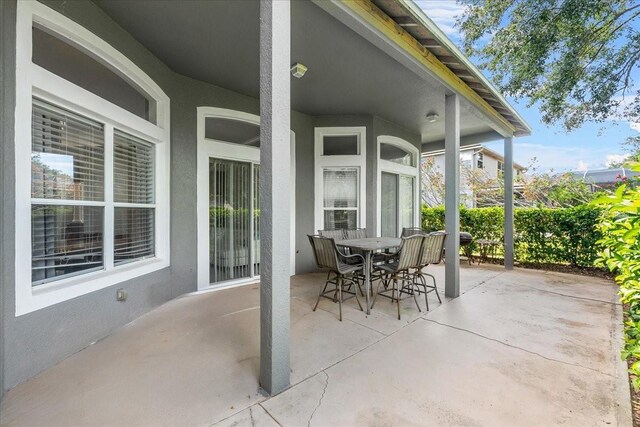 4013 Greystone Dr, Clermont, FL 34711 - view of patio / terrace with outdoor dining area