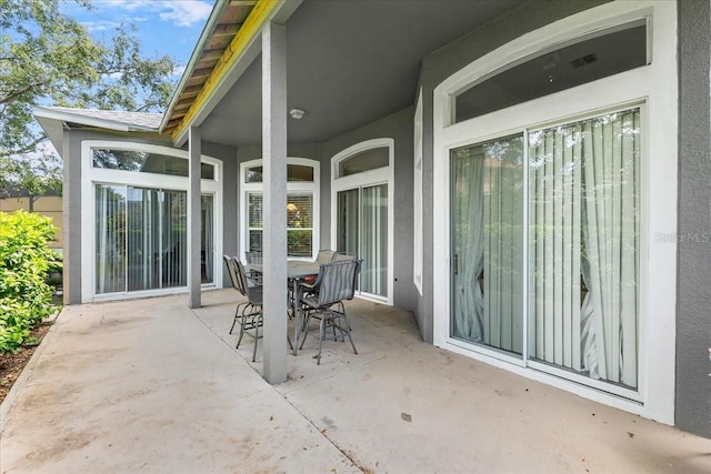 4013 Greystone Dr, Clermont, FL 34711 - view of patio featuring outdoor dining space